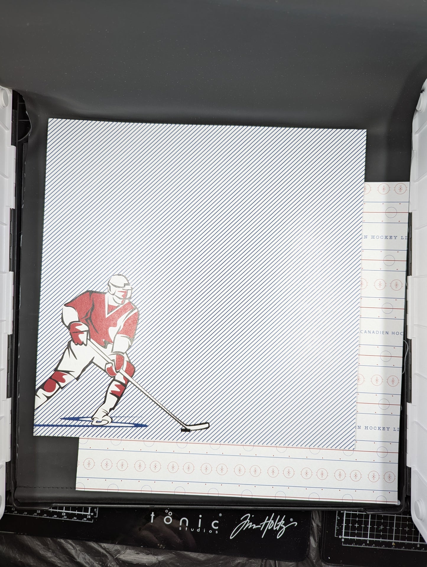 12x12 red and white hockey player