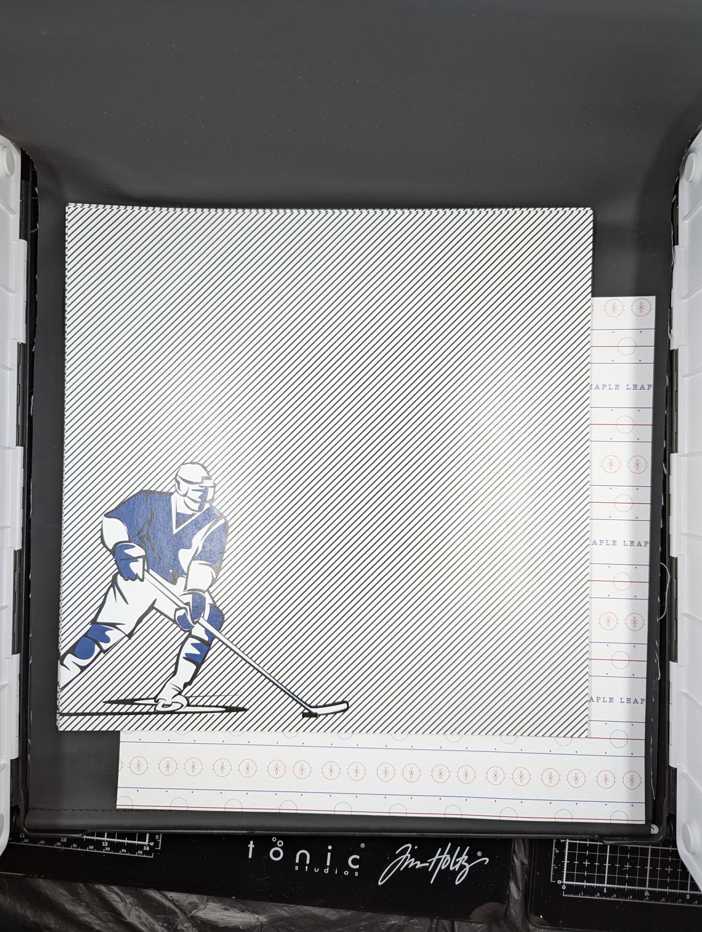 12x12 blue and white hockey player